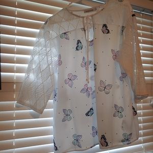 white silky top with butterflies